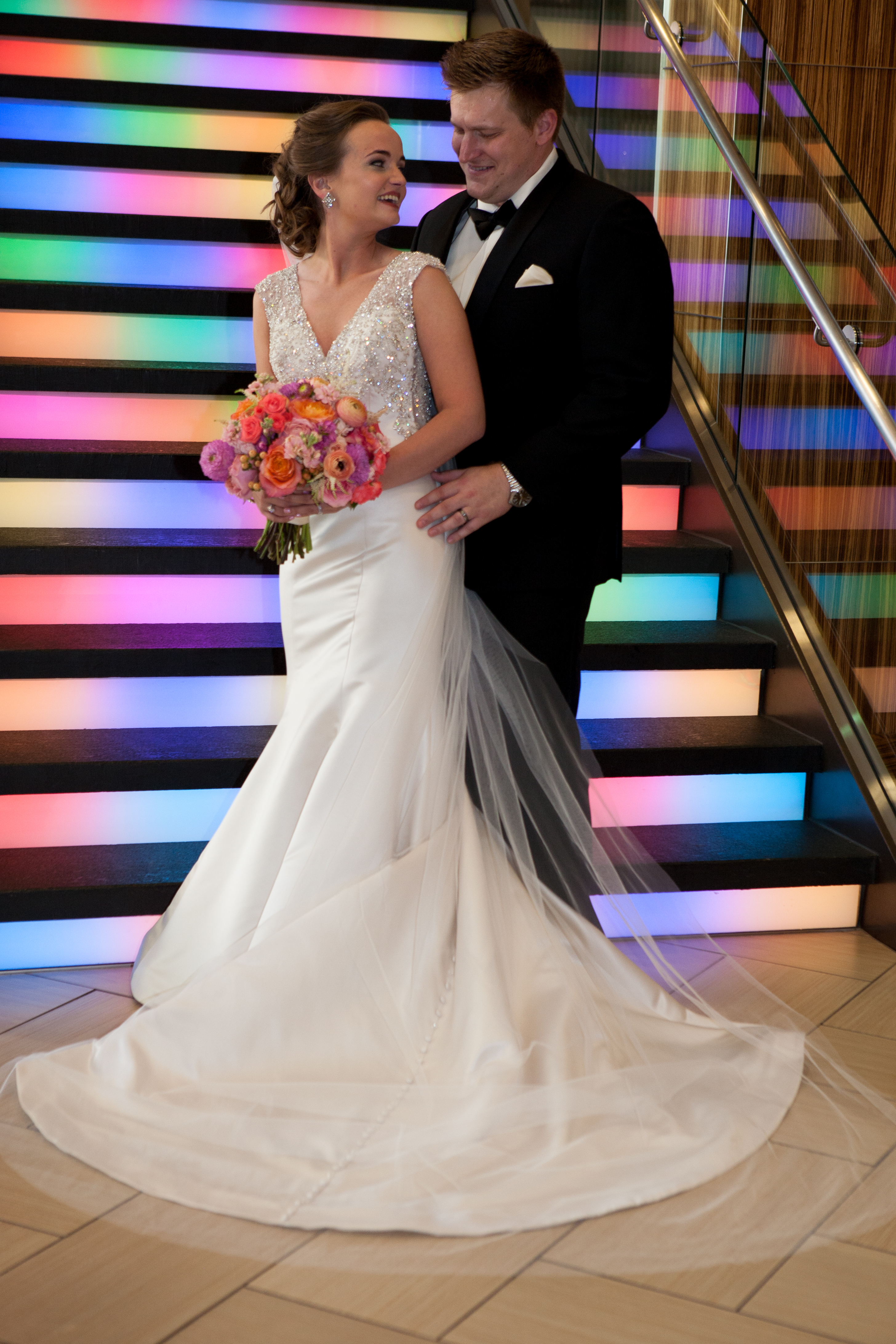 Bride and Groom in front of the rainbow stairs