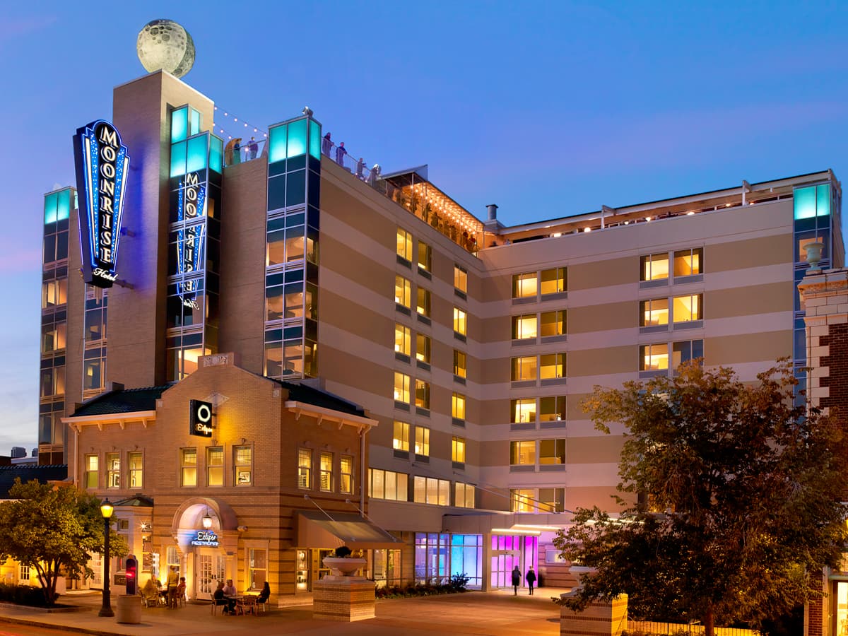 Moonrise Hotel exterior at night on the Delmar Loop in St Louis Exterior shot of the Moonrise Hotel at night with colorful lights emanating from the building