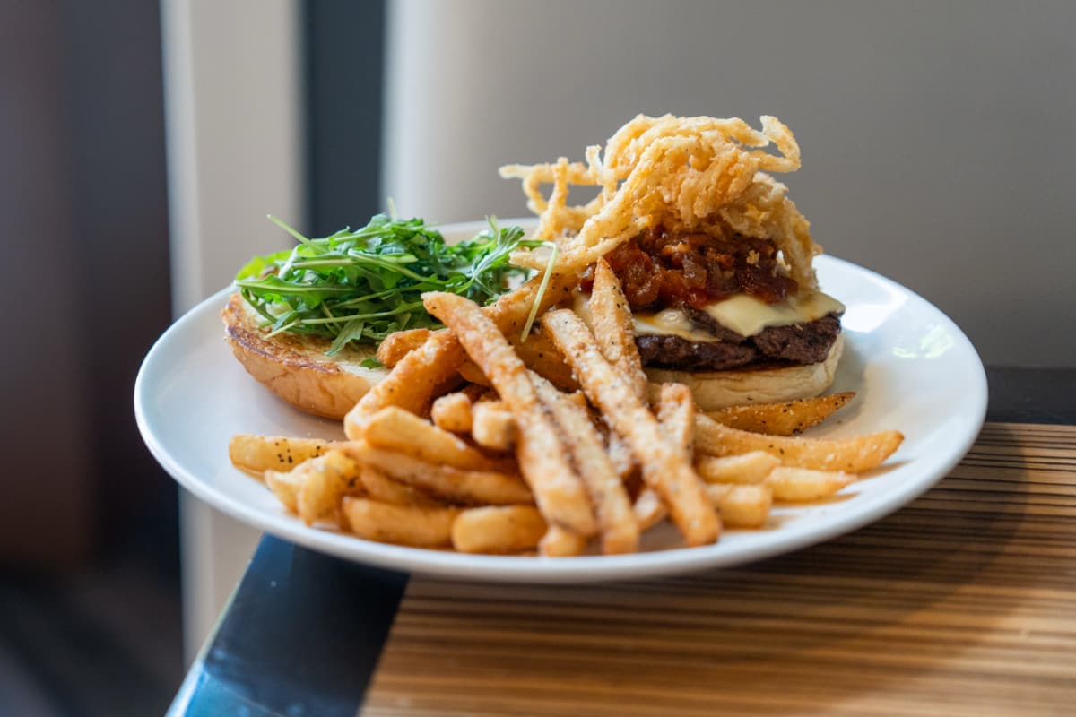 plate of burgers and fries at eclipse A plate of burgers and fries at eclipse restaurant