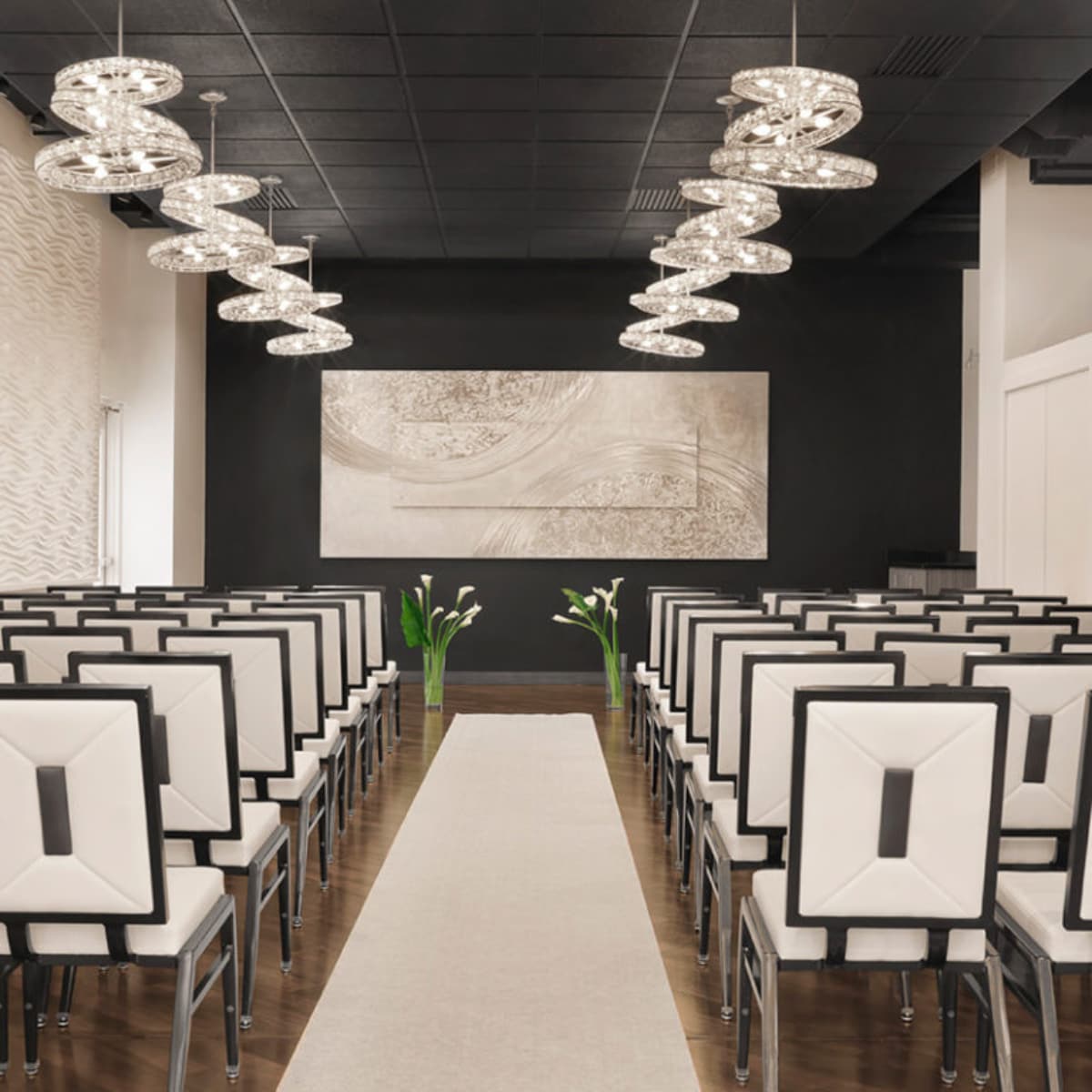 seating for an indoor wedding Chairs are set up for an indoor wedding ceremony.